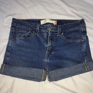 Blue cut-off Levi jeans